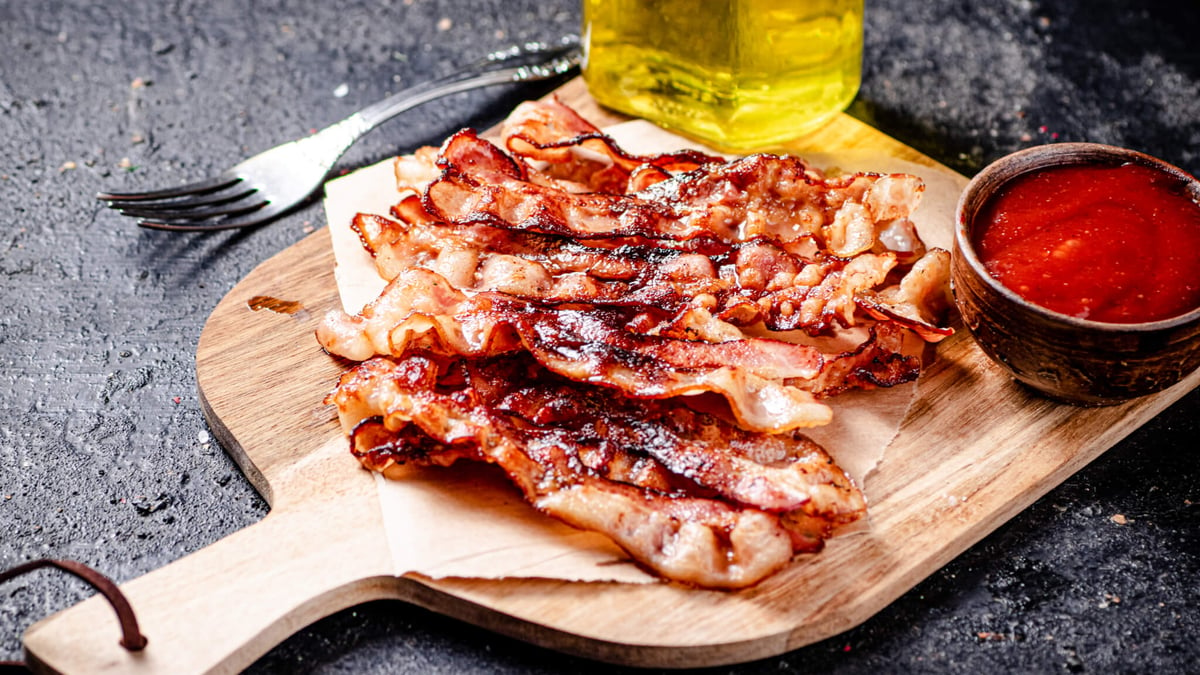 International Bacon Day September 7th 2024 Days Of The Year   Pieces Of Fried Bacon On A Wooden Cutting Board 2021 12 15 21 50 23 Utc 